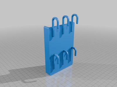 Phone jack wall cover for hanging keys
