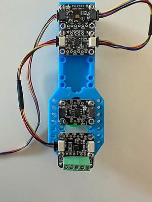 QuickStick for heat set inserts on a din rail