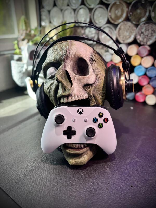 Zombie skull headphones and controller holder..stl