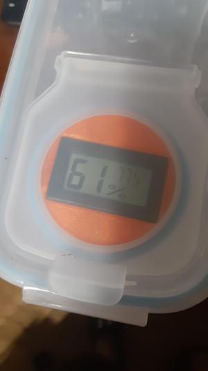 Hygrometer mount for cereal containers