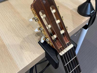 Guitar holder for a table