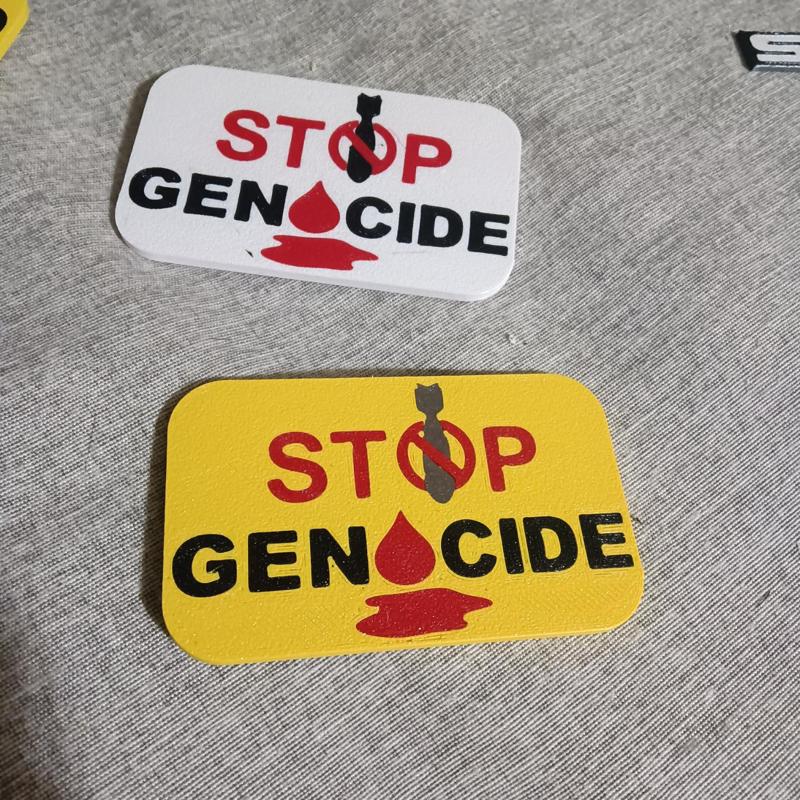 STOP GENOCIDE badge