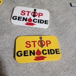 STOP GENOCIDE badge