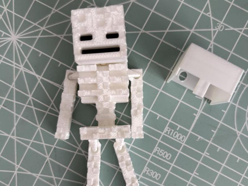 Minecraft skeleton keychain with helmet