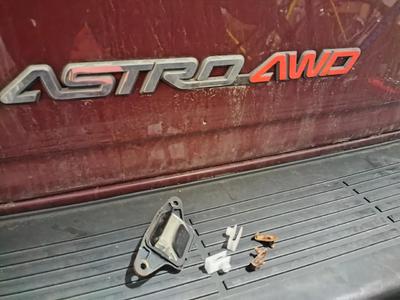 Nut-bracket-thingy for a 2004 Chevrolet Astro's license plate lamp housing   