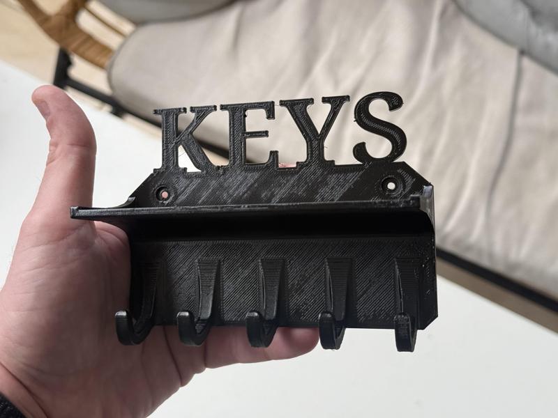 Wall-mounted keys holder with small shelf