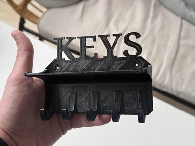 Wall-mounted keys holder with small shelf