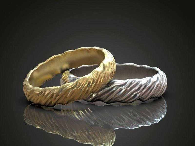 Wedding rings wavy natural shape pattern