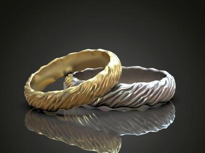 Wedding rings wavy natural shape pattern