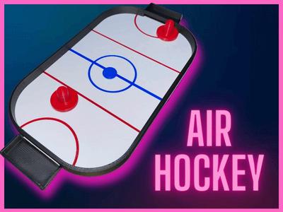 Mini desktop air hockey