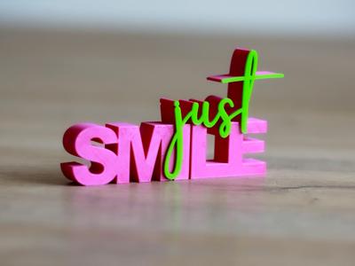 The inscription just smile