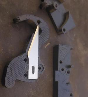 Filament cutter arm for wolfcraft 4196 blade