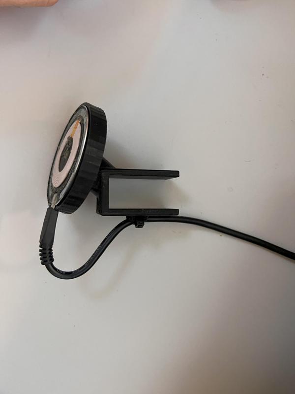 Holder for wireless magnetic charger