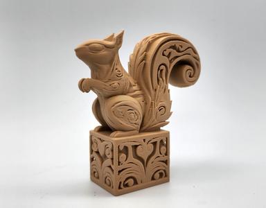 Wood-Carved Squirrel on a Box