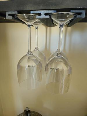 Wine glass holder adaptable