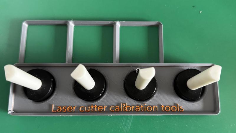 Laser cutter calibration tool organizer