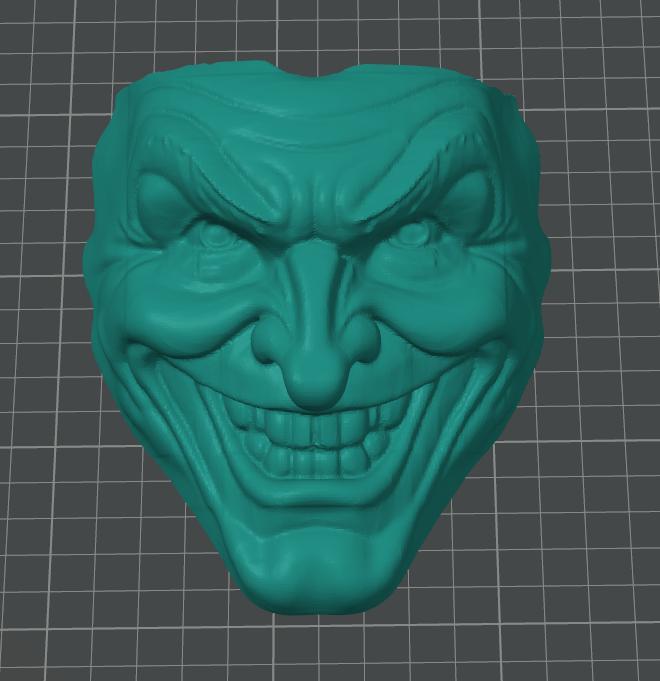 Wall mounted face mask of the joker