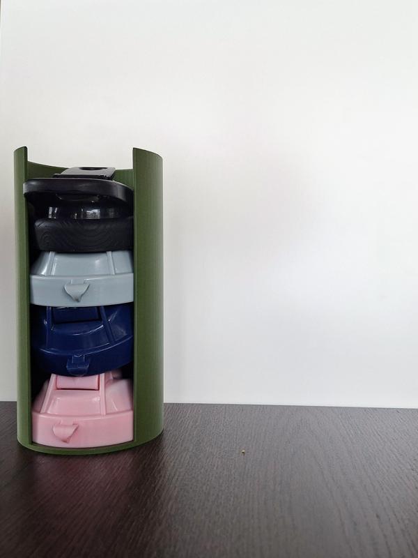 Holder for shaker lids