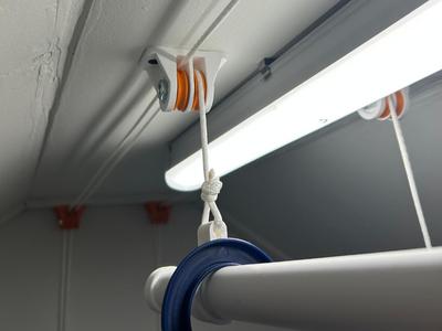 Ceiling mounted clothes dryer