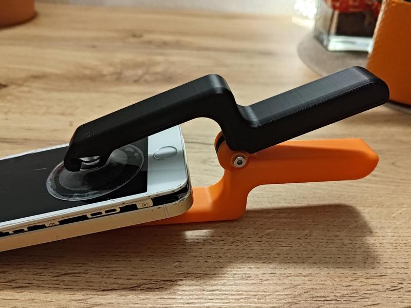 Pliers with suction cups tool for removing LCD