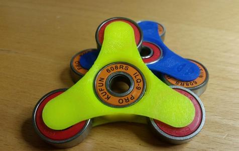 Open wheel four bearing fidget spinner