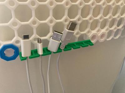 Multiboard USB cable holder
