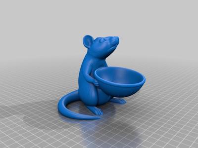 Rat holding a bowl
