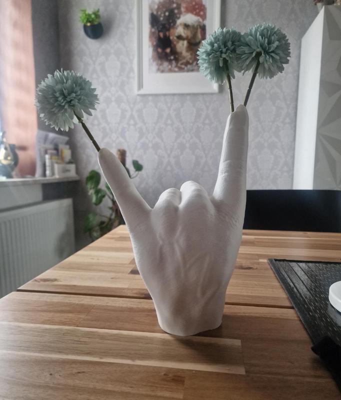 Rock Hand Vase Sing of the Horns Bowl Roses