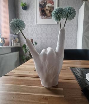 Rock Hand Vase Sing of the Horns Bowl Roses
