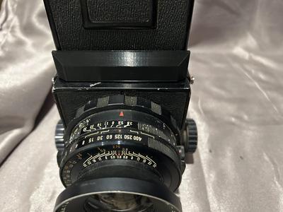 Mamiya RB67 Finder retaining logo bracket