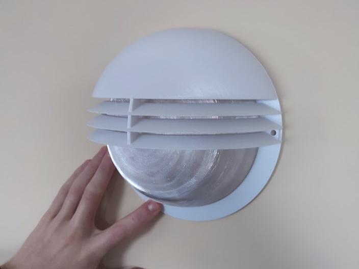 Multifunctional wall lamp with a robust design
