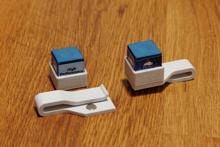 Billiard chalk holder.