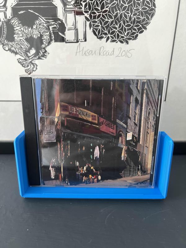 CD/DVD case holder