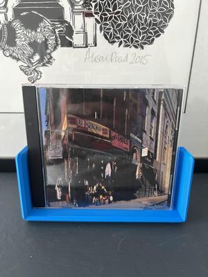 CD/DVD case holder
