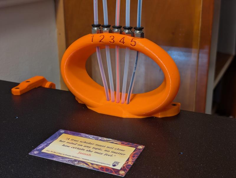 Elliptical MMU feedthrough for Prusa enclosure