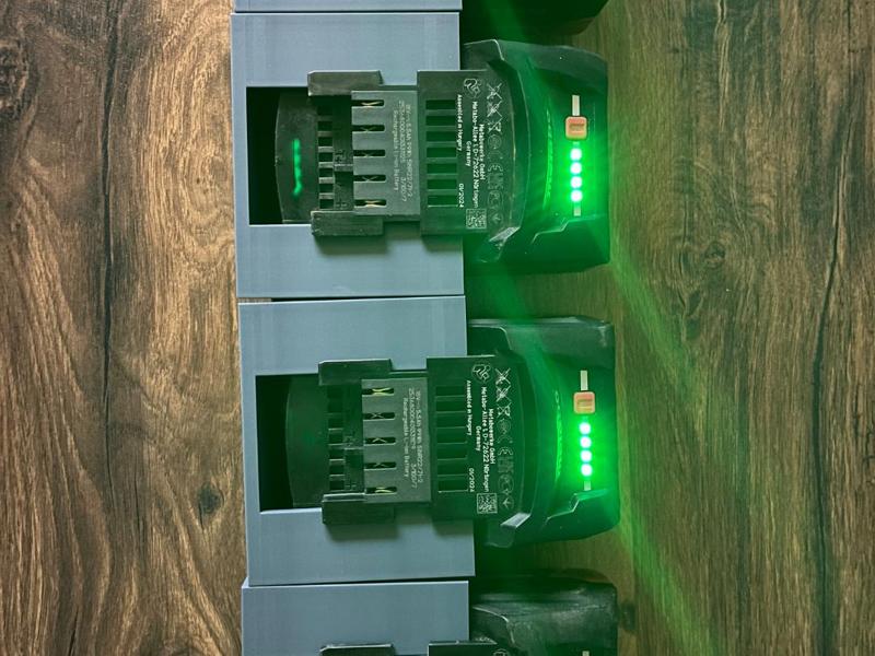Wand-mounted holder for CAS battery
