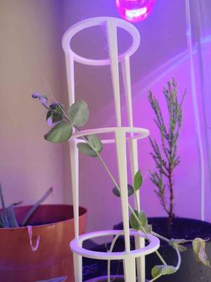 Stackable plant supporting tripod
