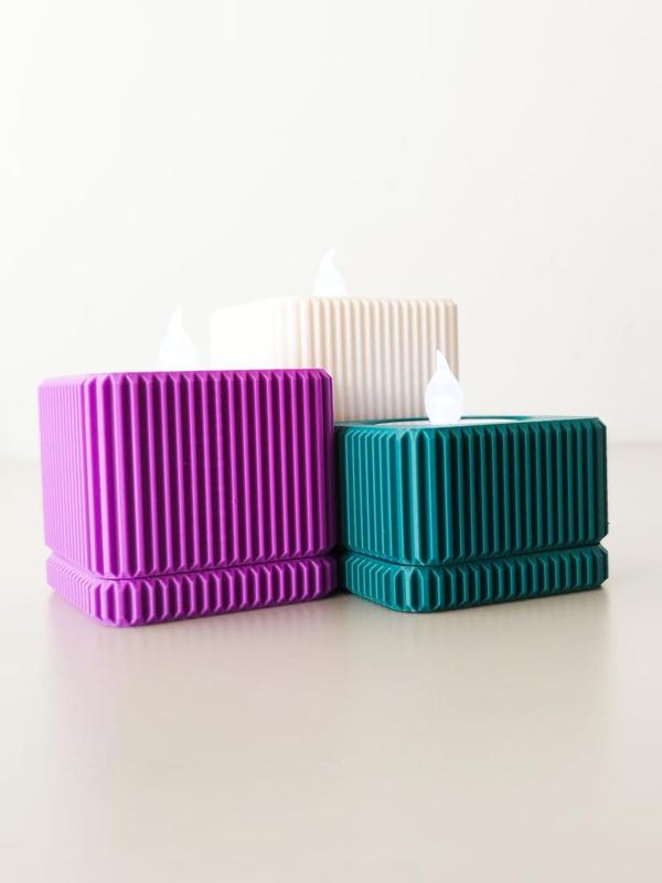 Textured square candle holder.