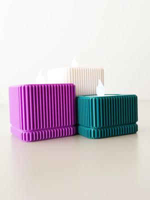 Textured square candle holder.