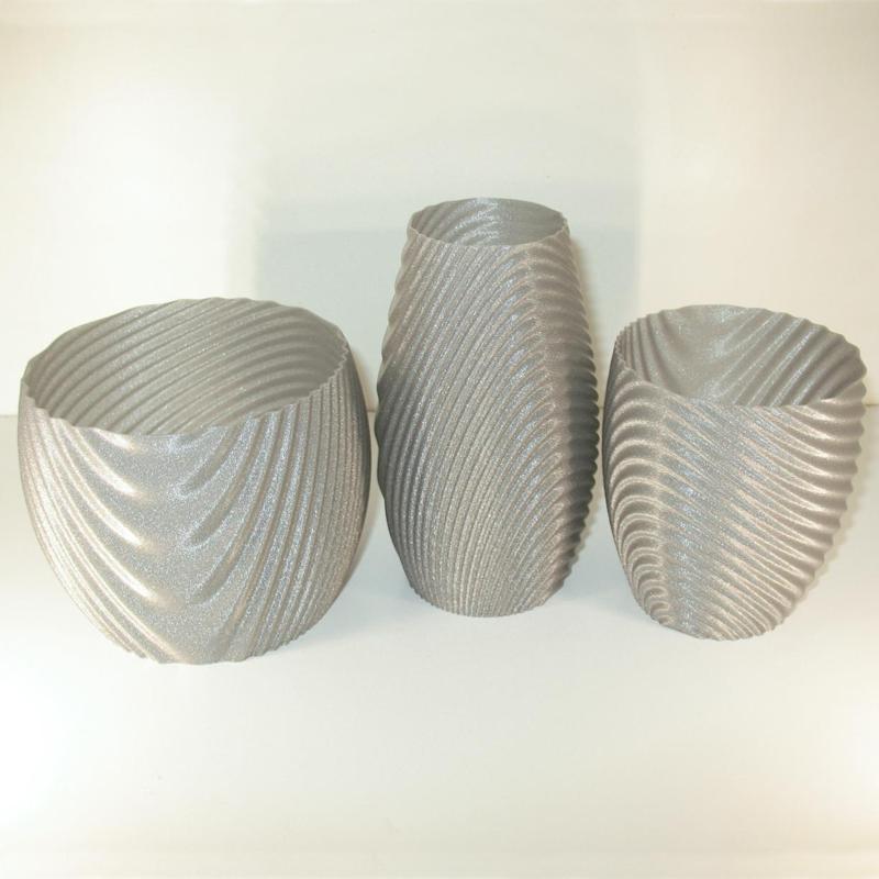 Wavy organic bowl, cups, vase and flower pot.