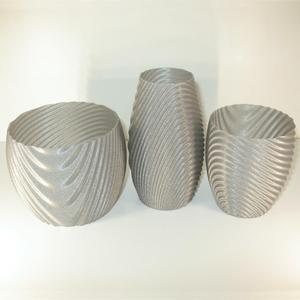 Wavy organic bowl, cups, vase and flower pot.