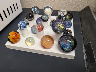 Storage rack for art glass marbles