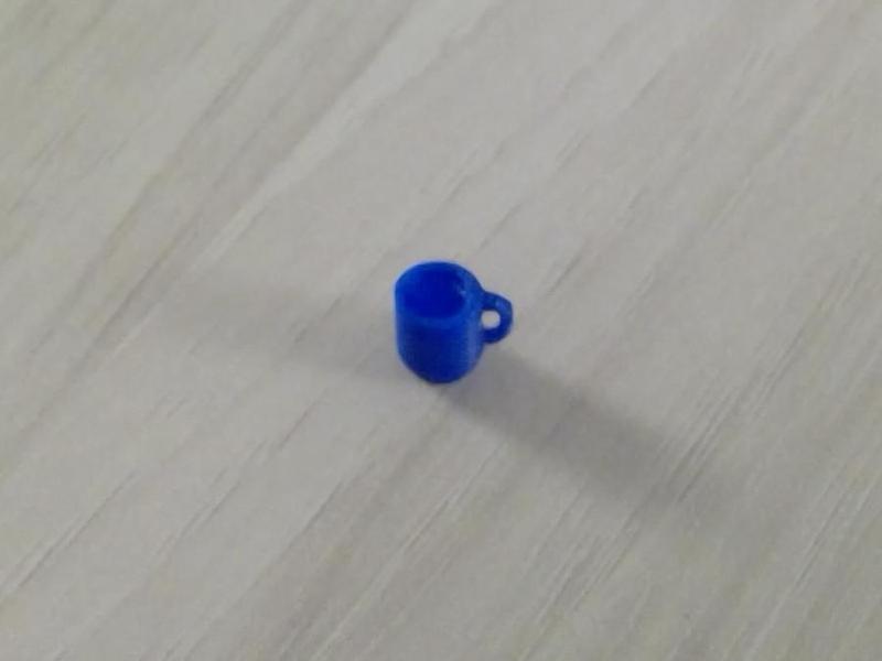 worlds smallest coffee cup (only .3 grams)