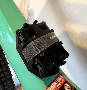 AirTag and multitool frame holder