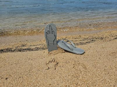 Middle finger flip-flops - perfect for the beach.