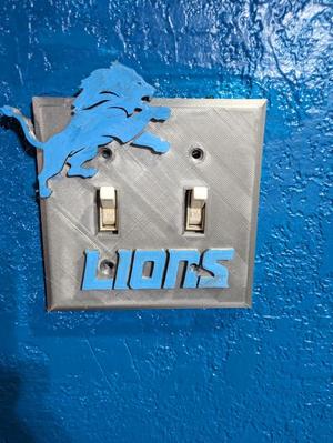 Lion's double light switch cover