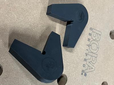 Low profile corner fixture for MFT table dog holes