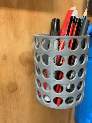 Wall mounted pencil holder