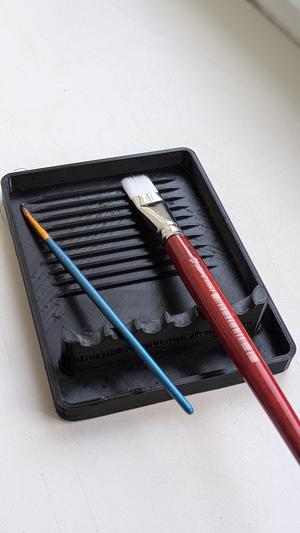 Stand for brushes.