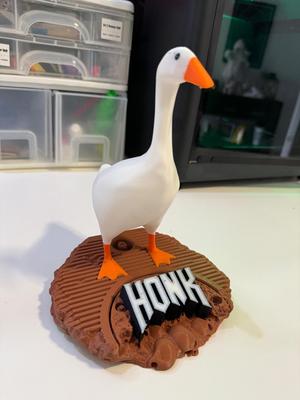 Untitled Goose Game - Entitled Goose Model on a base of destruction with a large HONK logo